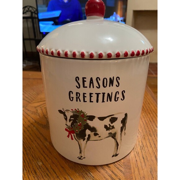 Seasons greetings cow white canister with red